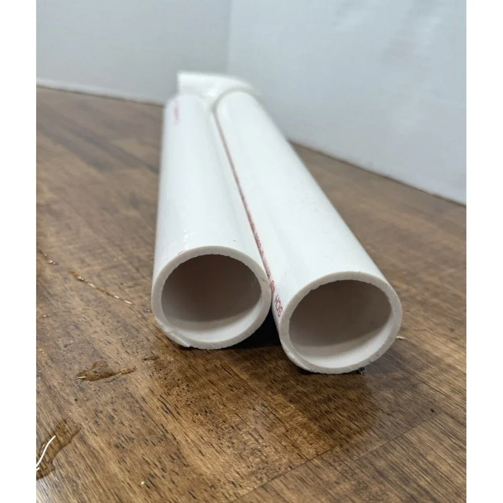 miscellaneous  Reptile supplies, One hide, PVC tubing, Food and water bowl ￼